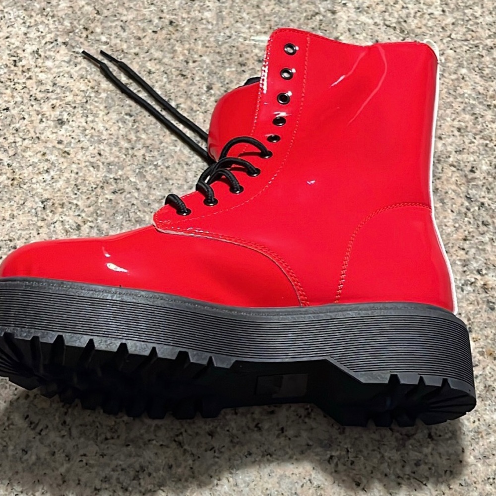 bright red lace up platform combat boots in size 9